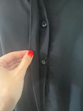 Chemise noire à détails paillettes